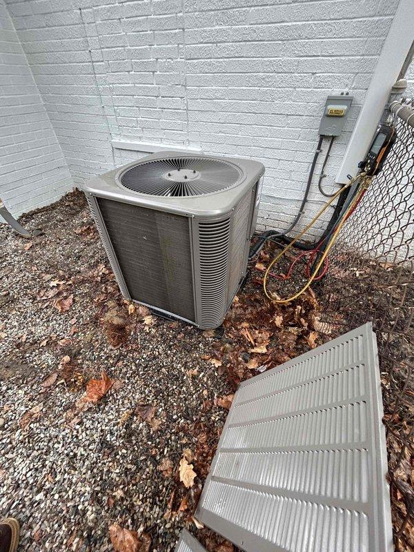 Performed routine air conditioning maintenance on two outdoor condenser units. Inspected both systems, cleaned exterior surfaces and coils of accumulated debris including leaves and organic matter, checked refrigerant lines and electrical connections, and verified proper operation of both units to ensure optimal cooling performance for the upcoming season.