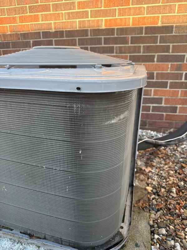 Completed scheduled AC tune-up and maintenance on 10-year-old Carrier residential air conditioning system. Performed comprehensive inspection of outdoor condenser unit, verified proper operation of all components including compressor, fan motor, and heat exchange fins. System tested and confirmed to be operating within normal parameters with no issues identified.