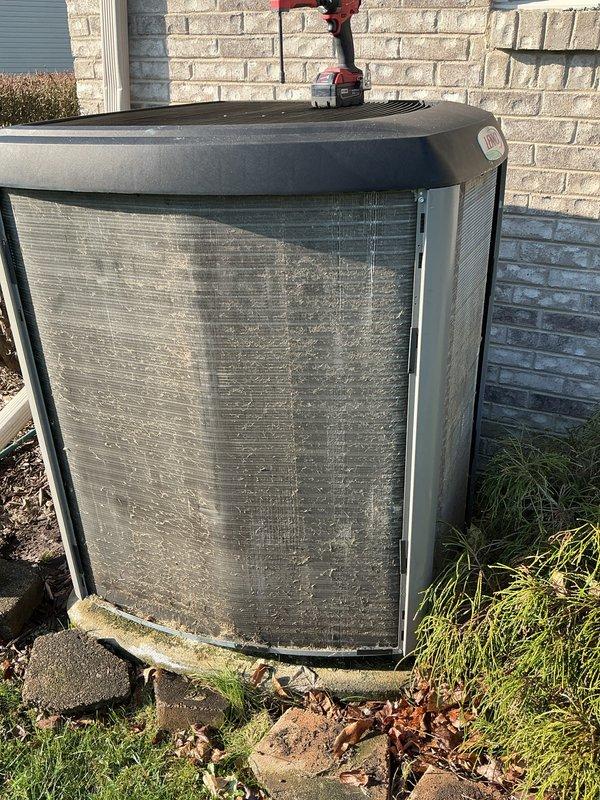 Completed annual HVAC maintenance service including furnace filter replacement and outdoor condenser unit inspection. Documented temperature readings with digital thermometer and assessed condenser coil condition, noting visible debris accumulation on protective grilles requiring attention during routine maintenance check.