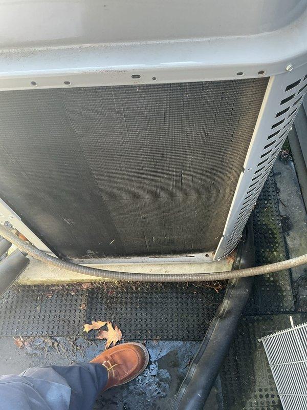 Performed scheduled maintenance on three outdoor air conditioning condenser units and furnace system. Conducted thorough inspection revealing heavy accumulation of dirt, dust, and debris on condenser coils and filter surfaces. Cleaned condenser coils using appropriate brushing techniques and tools to restore proper airflow and heat transfer efficiency. Replaced air filters and evaporator pads as specified. All three RAC units were serviced and returned to optimal operating condition.