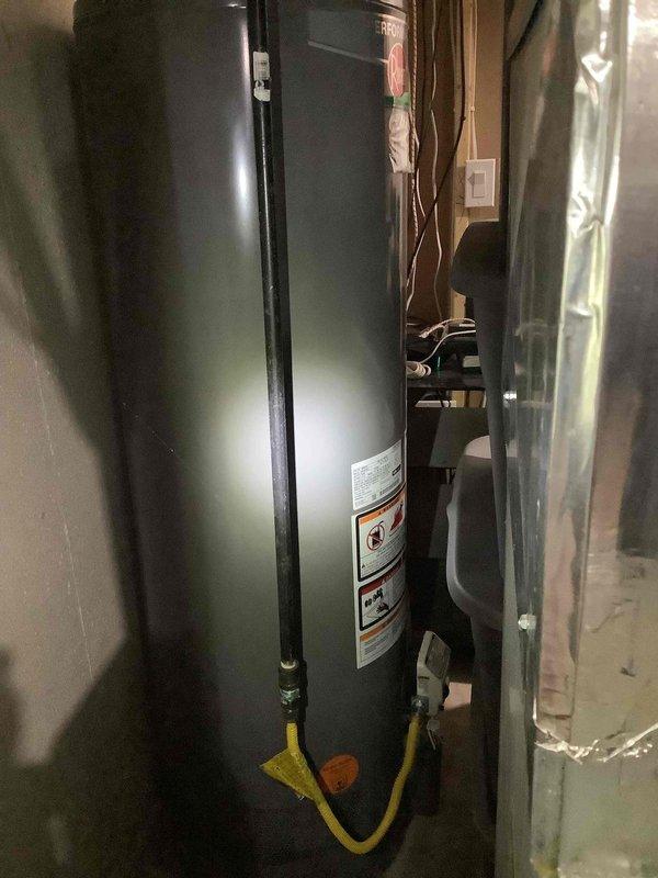 Conducted comprehensive site assessment for Generac generator installation at residential property with no existing backup power system. Evaluated electrical panel capacity and available breaker positions, documented gas line accessibility from water heater location, and photographed mechanical room layout to determine optimal generator placement and connection points for future installation.