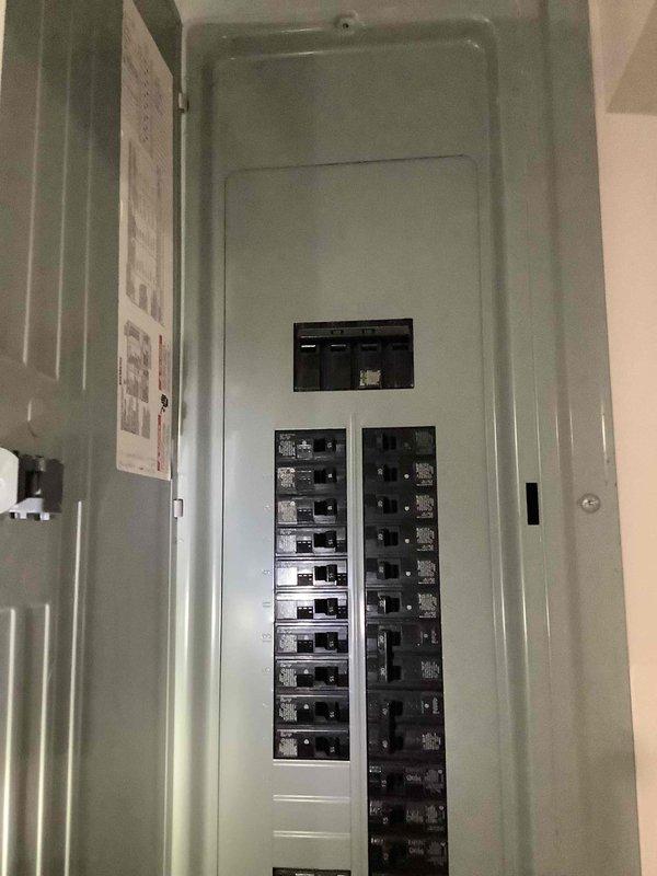 Conducted comprehensive site assessment for Generac generator installation at residential property with no existing backup power system. Evaluated electrical panel capacity and available breaker positions, documented gas line accessibility from water heater location, and photographed mechanical room layout to determine optimal generator placement and connection points for future installation.