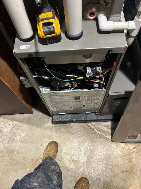 Completed comprehensive preventative maintenance on 5-year-old Lennox air conditioning system and forced air furnace per routine service request. Performed full AC tune-up including inspection of outdoor condenser unit, verified proper operation of fan motor and compressor, checked refrigerant levels, cleaned condenser coils, and inspected electrical connections. Accessed indoor furnace unit, inspected all internal components including blower assembly, heat exchanger, gas valve, and control board wiring. Verified all safety controls functioning properly, tested ignition system, and confirmed proper airflow throughout system. Both heating and cooling systems operating within manufacturer specifications with no deficiencies noted. All access panels secured and work area left clean upon completion.