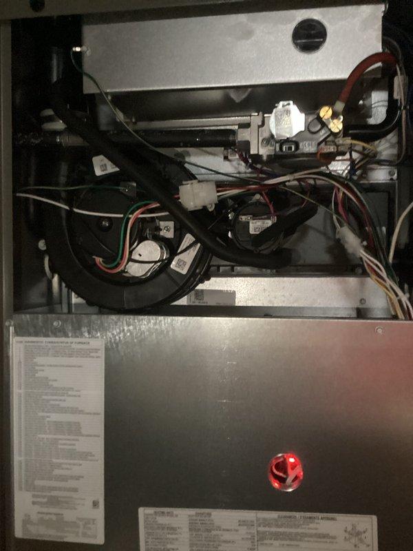 Completed comprehensive spring maintenance on Lennox forced air furnace and central air conditioning system. Performed full AC tune-up including refrigerant level verification, condenser coil cleaning, electrical connection inspection, and thermostat calibration. Inspected 1-year-old furnace components including burner assembly, heat exchanger, blower motor, gas valve connections, and all electrical wiring harnesses. Verified proper operation of ignition system, flame sensor, and safety controls. Cleaned blower assembly, replaced air filter, and tested airflow throughout system. Checked all wire connections, relays, and junction boxes for secure mounting and proper voltage. Inspected combustion chamber and confirmed all safety indicators functioning correctly. Both heating and cooling systems operating within manufacturer specifications with no issues identified. System ready for upcoming cooling season.