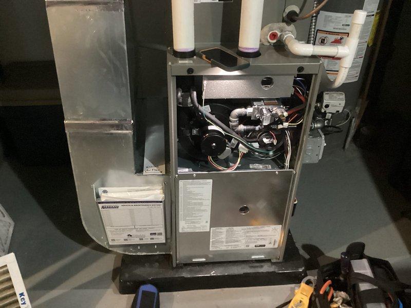 Completed annual furnace maintenance on Lennox heating system. Performed comprehensive tune-up including inspection of gas valve assembly, burner components, and heat exchanger. Verified proper operation of blower motor and checked all electrical connections and wiring harnesses. Inspected and tested exhaust and intake PVC venting system for proper draft and clearances. Evaluated humidifier operation and connections. Checked all safety controls and limit switches for proper function. Measured system temperatures and pressures to ensure equipment operating within manufacturer specifications. All components found to be functioning properly with no issues identified. System returned to normal operation.