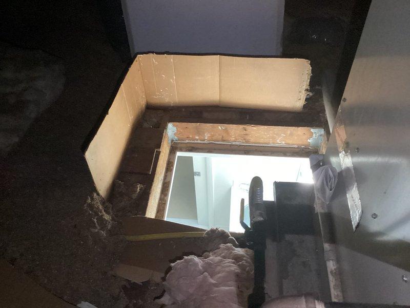 Completed annual heating maintenance tune-up on furnace system under Air Care Membership with no issues reported. Performed comprehensive inspection of furnace unit located in attic space, including examination of HVAC components, ductwork connections, and insulation integrity. System found operating properly with all components functioning within normal parameters. Documented equipment condition with photographs showing attic installation, flexible ductwork, and access point configuration for service records.