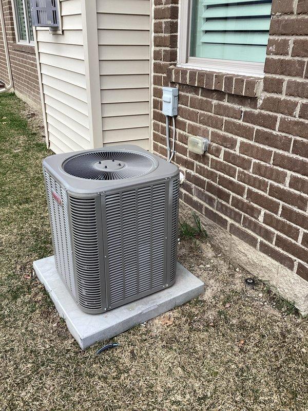 Completed annual cooling maintenance on residential split system. Inspected outdoor condensing unit, confirmed proper operation of compressor and condenser fan motor. Checked refrigerant levels and electrical connections at outdoor unit. Indoor air handler inspection revealed significant rust corrosion and standing water in drain pan, indicating chronic condensate drainage issues. Documented excessive moisture damage to metal components and mineral deposit buildup. Control board and electrical connections inspected and found operational despite moisture exposure in cabinet. Recommended immediate attention to drainage system and potential drain pan replacement to prevent further deterioration and possible water damage to structure.