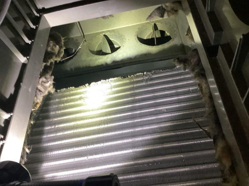 Performed scheduled HVAC system maintenance and inspection within specified time window. Assessed homeowner's concern regarding outdoor condensing unit installation and determined existing pad configuration was adequate for unit size and airflow requirements—no box platform necessary. Inspected heat exchanger and evaporator coil assembly, noting normal operational wear with minor dust accumulation around coil edges. Installed new pleated air filters to maintain proper system airflow and indoor air quality. System operational and performing within normal parameters upon completion.