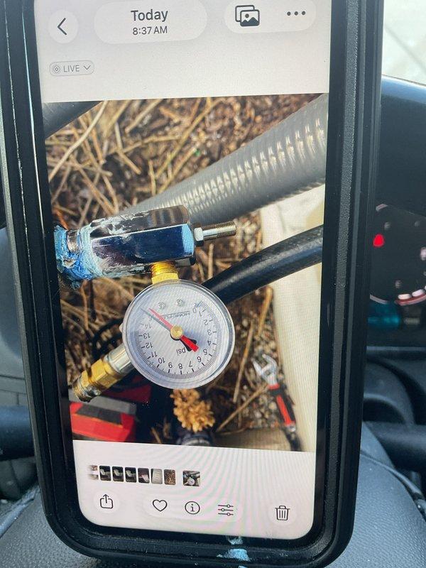 Performed gas pressure test on HVAC system using calibrated pressure gauge and testing equipment. Connected test gauge assembly with brass fittings to gas line and monitored pressure readings to verify system integrity and proper gas flow. Documented test results with photographic evidence showing gauge readings and equipment setup, confirming system passed pressure test requirements and is operating within acceptable parameters.