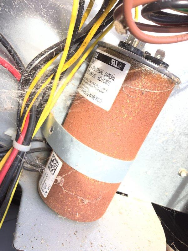 Completed routine Air Care Maintenance inspection on residential HVAC system. Replaced dirty air filter with new pleated filter to restore proper airflow and system efficiency. Inspected electrical components including capacitor and associated wiring, which showed normal operation with minor dust accumulation typical of regular use.