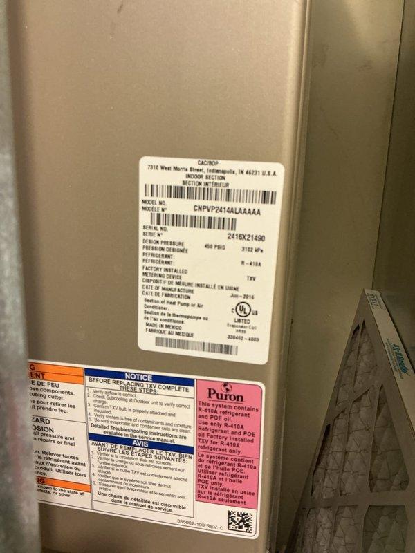 Completed annual HVAC maintenance and city certification for rooftop zone cooling and heating systems. Performed comprehensive inspection of Carrier indoor section unit (Model CNPVP2414ALAAAAA) with Puron refrigerant, verified all manufacturer labels and safety notices were intact and legible, and documented equipment condition. Inspected attic space insulation and ventilation components to ensure proper airflow and system efficiency for both heating and cooling operations.