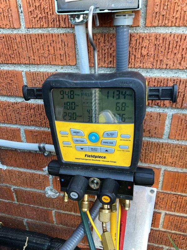 Completed scheduled Air Care Cooling maintenance on residential air conditioning system. Performed comprehensive system diagnostics using refrigerant manifold gauges to verify operating pressures and temperatures across the condensing unit. All refrigerant readings were within manufacturer specifications. Inspected outdoor condenser unit for proper operation, noting accumulated dirt and debris on exterior casing that was documented for customer awareness. Verified fan motor operation and confirmed adequate airflow through top-mounted discharge grille. System operating normally with no immediate service needs identified at time of inspection.