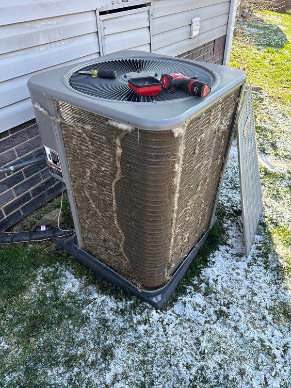 Responded to no-heat emergency call where customer reported sparks from furnace before shutdown. Performed diagnostic inspection of furnace unit, removed access panel and examined internal components including control board, wiring harnesses, and gas valve assembly. Identified potential electrical issue requiring further repair work. Replaced furnace filter and conducted exterior inspection of air conditioning condenser unit as part of recurring Air Care Heating and Cooling maintenance program. Scheduled follow-up appointment for additional repairs to resolve electrical concerns and restore heating system to safe operating condition.