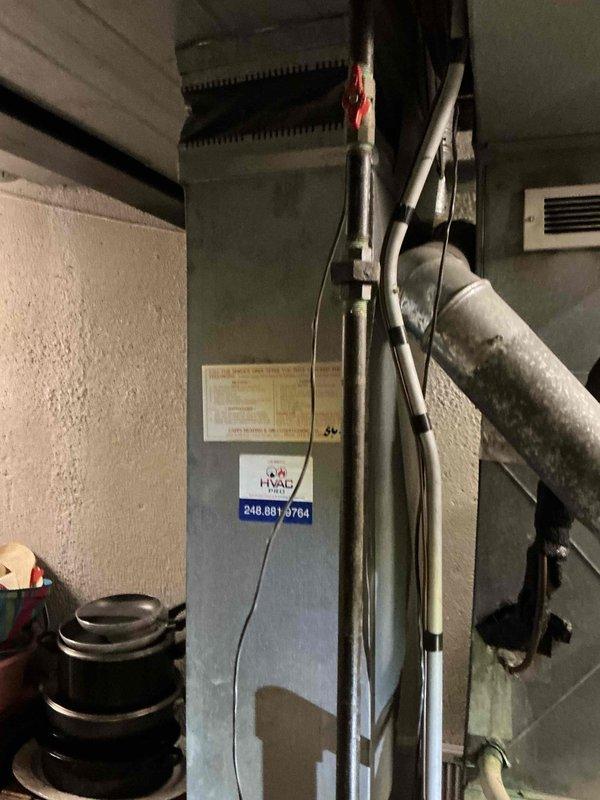 Provided estimate for replacement of 33-year-old natural gas furnace located in basement that is experiencing intermittent operation and has been deemed unsafe to operate. Assessed existing HVAC system including ductwork configuration, venting requirements, and utility connections to determine proper replacement specifications for new high-efficiency furnace installation.