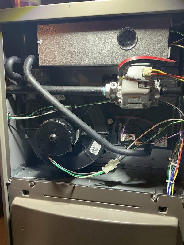 Completed comprehensive HVAC maintenance service on one-year-old forced air furnace and air conditioning system. Performed full system inspection including heat exchanger examination, blower motor assembly check, electrical connections verification, and condensate line assessment. All components found operating within normal parameters with no deficiencies noted; system performing properly and ready for continued service.