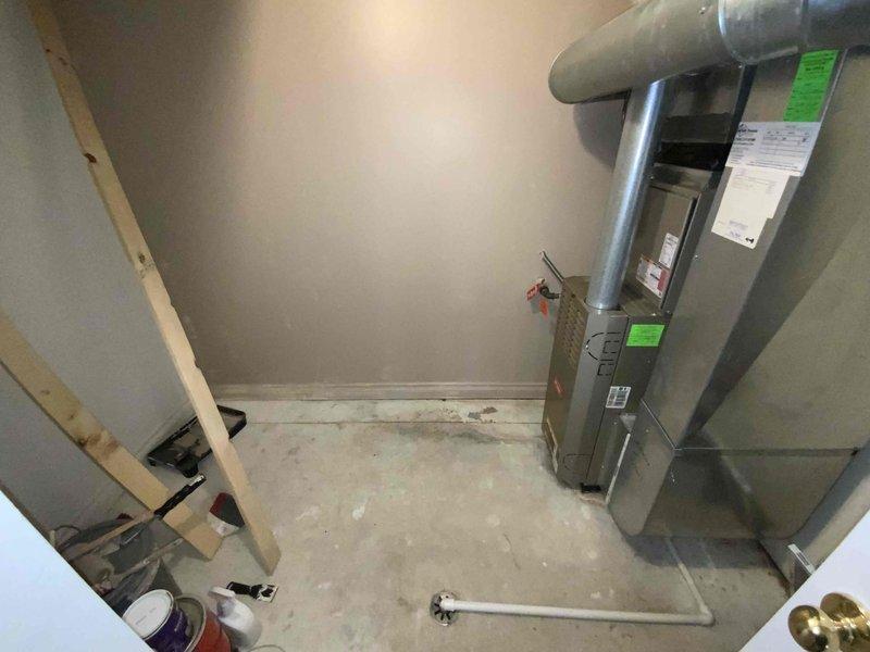 Conducted comprehensive full system evaluation of 21-year-old Bryant HVAC system located in basement utility room. Assessed existing gas furnace, ductwork configuration, and overall mechanical installation to provide complete system replacement estimate for customer requesting immediate replacement timeline.