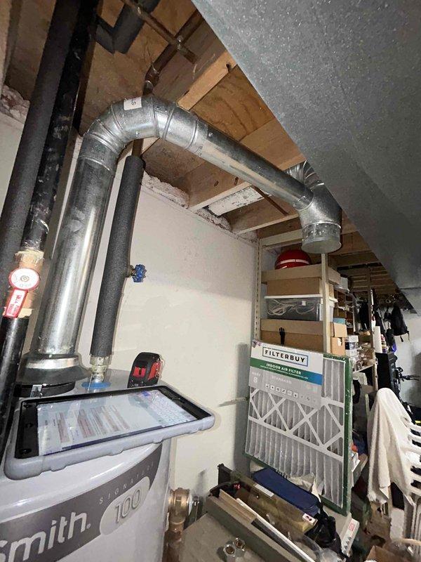Responded to no heat call on 28-year-old gas forced air furnace that was completely out of service. Performed comprehensive system evaluation and provided full system replacement estimate for aging equipment that had reached end of service life. Documented existing installation including furnace, ductwork configuration, and mechanical room layout with photographic evidence for quote preparation.
