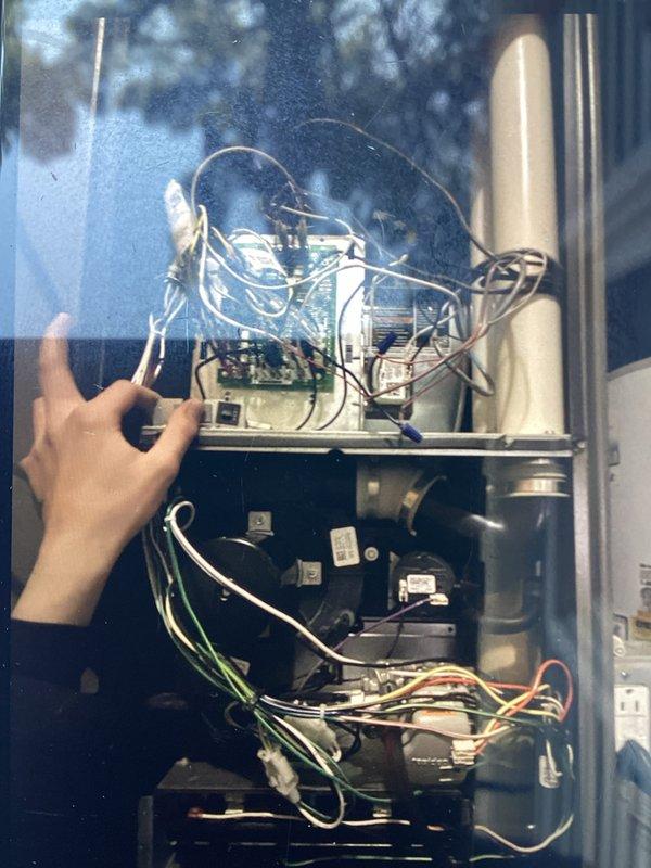 Completed scheduled Air Care Heating and Cooling maintenance on HVAC system. Upon inspection, discovered severely contaminated evaporator coil with extensive accumulation of dust, debris, and matted fibrous material causing significant airflow restriction. Removed and cleaned coil assembly to restore proper system efficiency. Inspected gas furnace internal components including blower motor assembly, inducer fan, control board, and electrical connections. Verified all wiring connections, capacitor operation, and PVC condensate drainage system. System tested and confirmed operational following maintenance procedures.