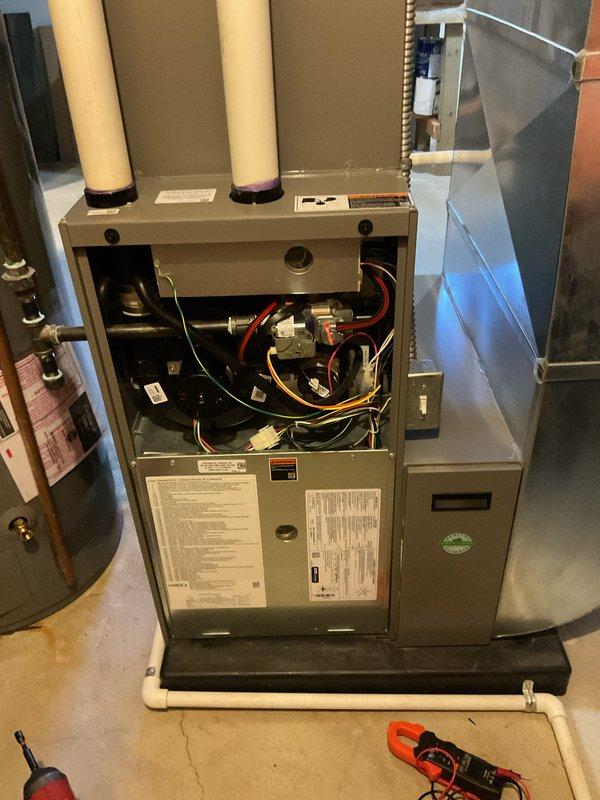 Completed annual heating maintenance on residential furnace system. Performed comprehensive inspection of all internal components including blower motor assembly, electrical connections, gas valve operation, and control board functionality. Replaced air filter and conducted safety checks on venting system, verified proper operation of all mechanical and electrical systems, and confirmed unit is operating within manufacturer specifications.