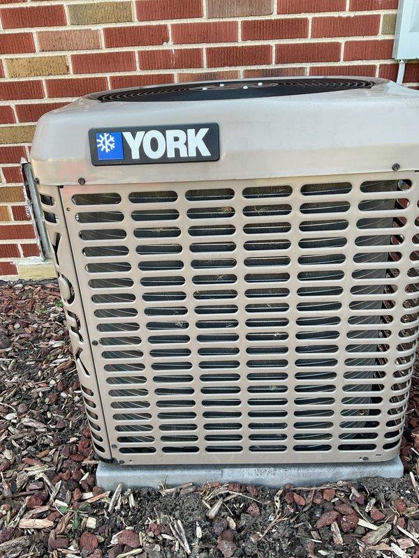 Performed annual cooling maintenance on York air conditioning system. Connected digital manifold gauges to measure refrigerant pressures and verify system operating parameters. Inspected condenser unit exterior condition, coil cleanliness, and confirmed proper airflow through protective grille. All system readings within normal operating range, unit functioning as designed.