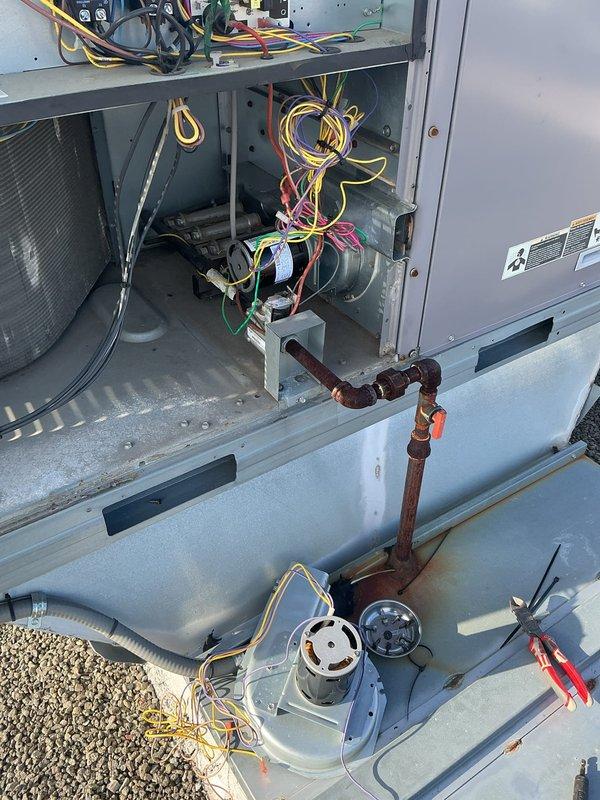 Responded to service call for HVAC unit experiencing operational issues. Successfully replaced one defective inducer motor (PN 48TM000646) and two worn blower wheel bearings (PN KT61DZ030). Accessed unit interior, disconnected electrical connections, and removed failed components. Installed new inducer motor and bearing assemblies, ensuring proper alignment and secure mounting. Verified all electrical connections were properly terminated and tested unit operation. System restored to full functionality with improved airflow and quiet operation.