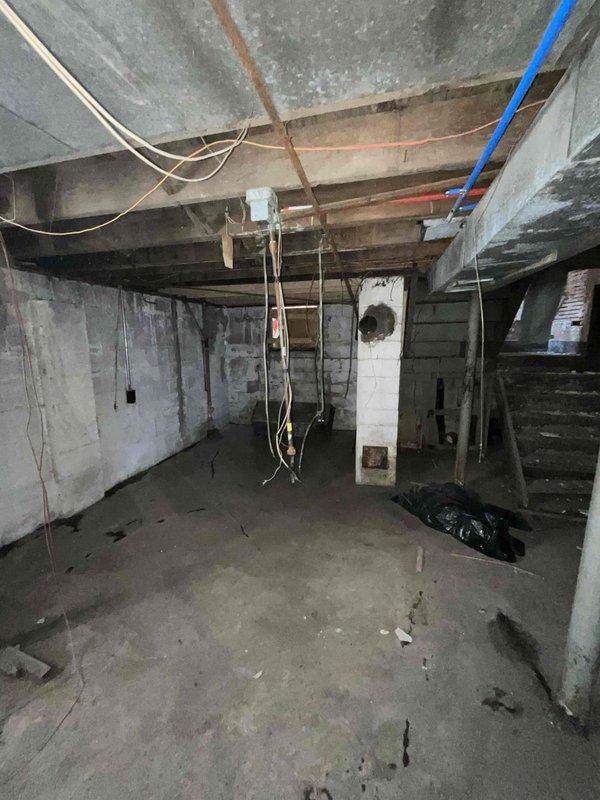 Provided comprehensive estimate for complete furnace and ductwork replacement system in unfinished basement area. Current natural gas furnace is non-operational with no existing equipment age information available. Assessment included evaluation of existing galvanized metal ductwork showing significant aging and deterioration, exposed utility infrastructure, and basement space conditions to determine proper equipment sizing and installation requirements for new gas furnace system and complete duct replacement.
