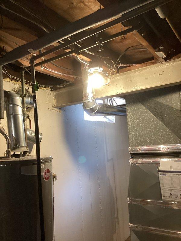 Completed full HVAC system installation including a 70,000 BTU high-efficiency gas furnace (Model ML196UH070XE36BK) and 2-ton air conditioning unit (Model ML13XC1-024-230) with rear discharge configuration in basement utility area. Installation included humidifier integration, ductwork liner, MERV 11 filter media, new thermostat, and reconnection of all electrical and mechanical systems to existing infrastructure. All necessary mechanical and electrical permits were obtained prior to installation, and system was tested for proper operation upon completion.
