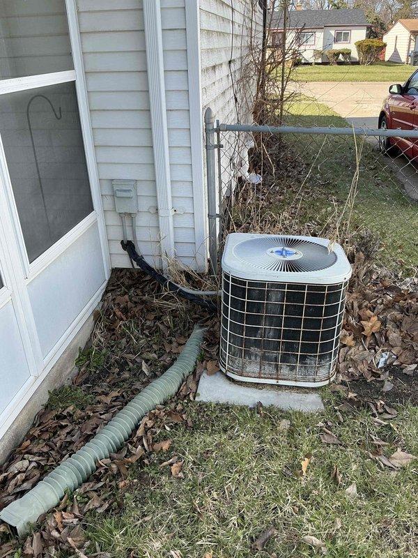Performed full system estimate for residential HVAC replacement after diagnosing failed blower motor in existing furnace unit located in basement. Evaluated both indoor furnace with plenum and condensate drainage system, as well as outdoor condenser unit showing signs of age and weathering. Provided comprehensive replacement quote for complete heating and cooling system to address immediate equipment failure and customer's preference for full system upgrade rather than component-level repair.
