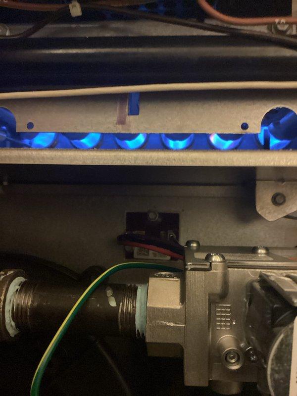 Completed complimentary annual heating and cooling inspection on 2-year-old system. Performed comprehensive AC tune-up and furnace evaluation, including burner inspection with visual confirmation of proper flame characteristics, gas valve operation check, and electrical component verification. All systems operating within normal parameters with no issues identified; unit maintained in good working condition.