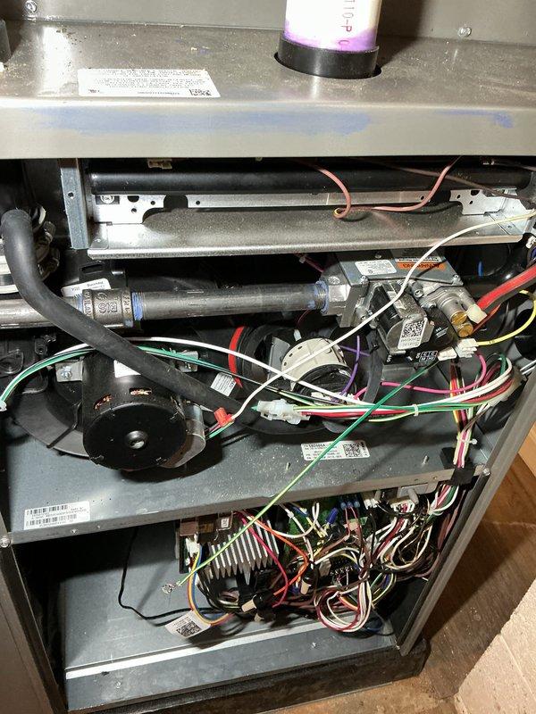 Completed scheduled AHC maintenance service on residential HVAC system. Accessed interior compartment, inspected blower motor assembly, electrical connections, and control components. Replaced air filters and evaporator pads as requested, verified all wire harnesses and capacitor connections secure, and confirmed proper system operation before closing access panel.