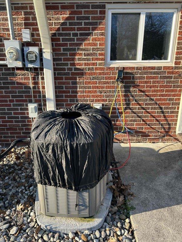 Responded to service call for air conditioning system not blowing cold air with attic-mounted air handler. Performed diagnostic inspection of system components, including examination of refrigerant valves and connections at the condensing unit. Verified proper operation of outdoor unit and checked refrigerant pressures. System restored to proper cooling operation and confirmed cold air delivery at registers.