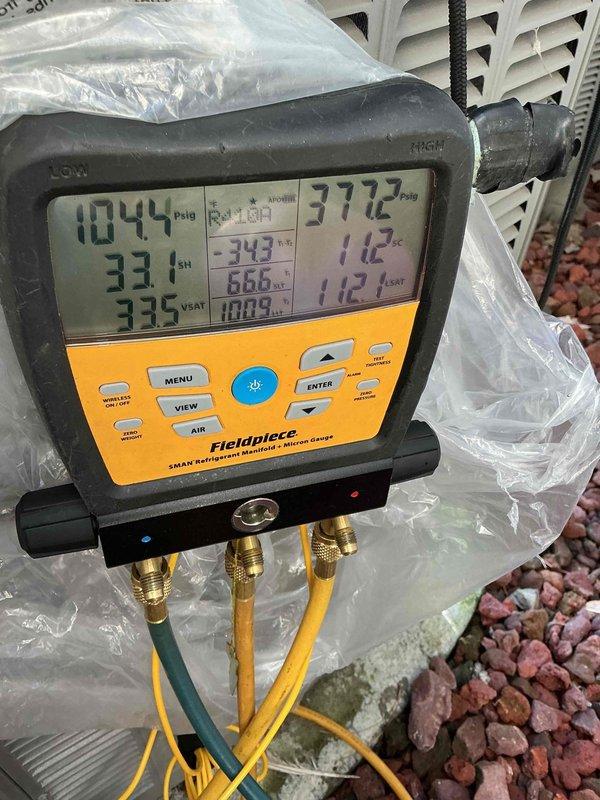 Responded to service call for R-410A refrigerant system. Using Fieldpiece SMAN digital manifold gauge, verified system pressures and temperatures. Added UV leak detection dye and recharged system with refrigerant to restore proper operating levels and prepare for future leak detection if necessary.