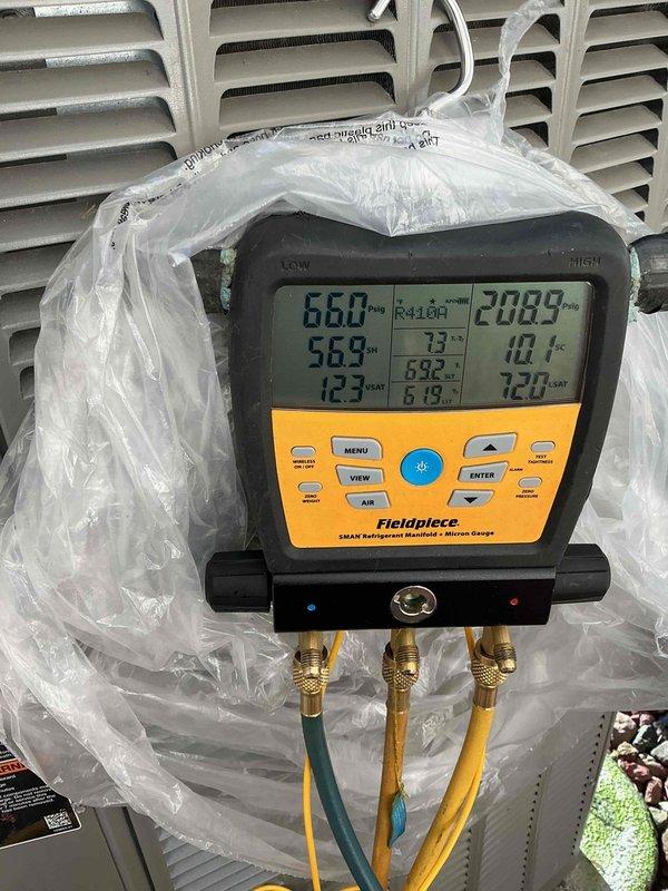 Responded to service call for R-410A refrigerant system. Using Fieldpiece SMAN digital manifold gauge, verified system pressures and temperatures. Added UV leak detection dye and recharged system with refrigerant to restore proper operating levels and prepare for future leak detection if necessary.