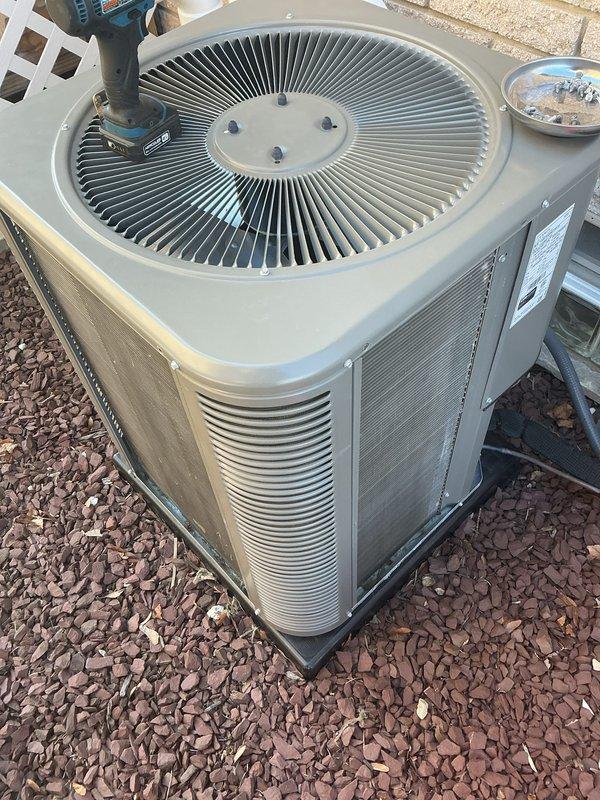 Completed annual preventive maintenance on residential split system air conditioning unit. Performed comprehensive inspection of outdoor condenser unit, verified proper operation of fan motor and compressor, cleaned condenser coils, checked refrigerant pressures, and confirmed electrical connections were secure. Unit operating within manufacturer specifications with no deficiencies noted at time of service.