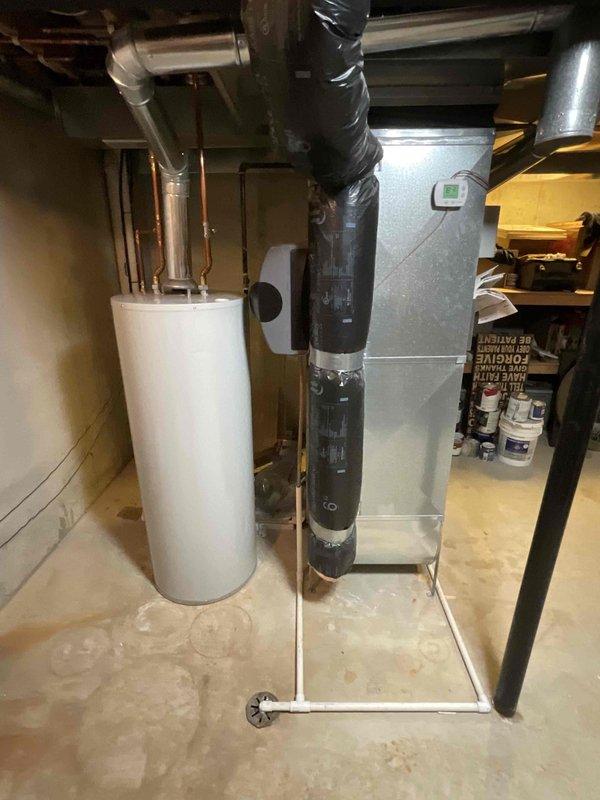 Provided comprehensive estimate for complete HVAC system replacement in basement location, including natural gas furnace and air conditioning unit for 25-year-old equipment. Assessment covered requirements for two-zone system configuration with dual thermostat installation to accommodate existing ductwork and layout. Both current heating and cooling units operational at time of evaluation but nearing end of service life, requiring full system upgrade recommendation.