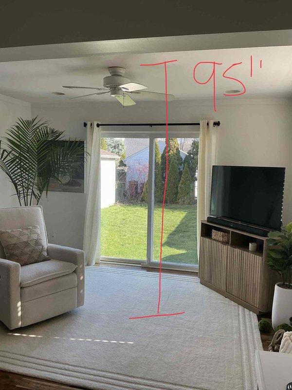 Provided estimate for new Mitsubishi mini split installation in single-room living area with sliding glass door access. Assessed electrical panel capacity and confirmed adequate breaker availability for new system installation, documented interior space measurements and equipment placement requirements for single-zone ductless heat pump system.