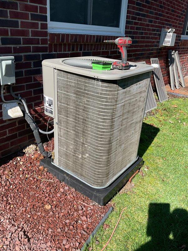 Completed annual cooling maintenance on residential air conditioning system. Performed comprehensive inspection of outdoor condensing unit, noting significant weathering and mineral deposits on exterior panels indicating potential water exposure or environmental degradation. Conducted standard maintenance procedures including system evaluation and documentation of unit condition. Customer advised that filters and evaporator pads may require replacement at next service interval.