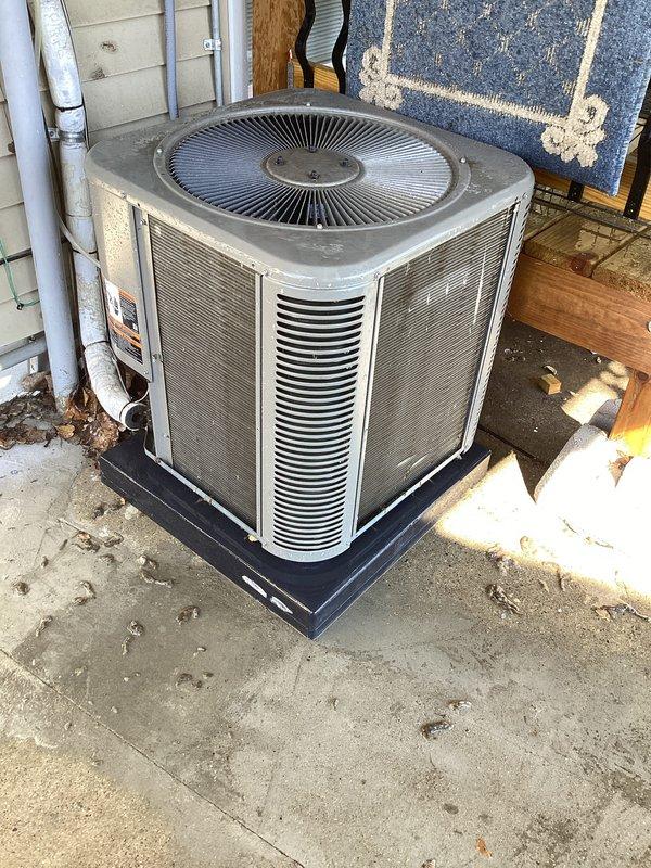 Completed annual cooling maintenance on outdoor condensing unit. Performed comprehensive system inspection including visual assessment of cabinet condition, fan operation, and refrigerant line connections. Unit showed normal weathering consistent with outdoor exposure but remains in functional condition. Condenser coils exhibited moderate dirt accumulation on exterior surfaces. Verified unit is properly mounted on isolation pad with adequate clearance for airflow. Documented equipment condition with photographs for service records. No filters required for this system configuration.