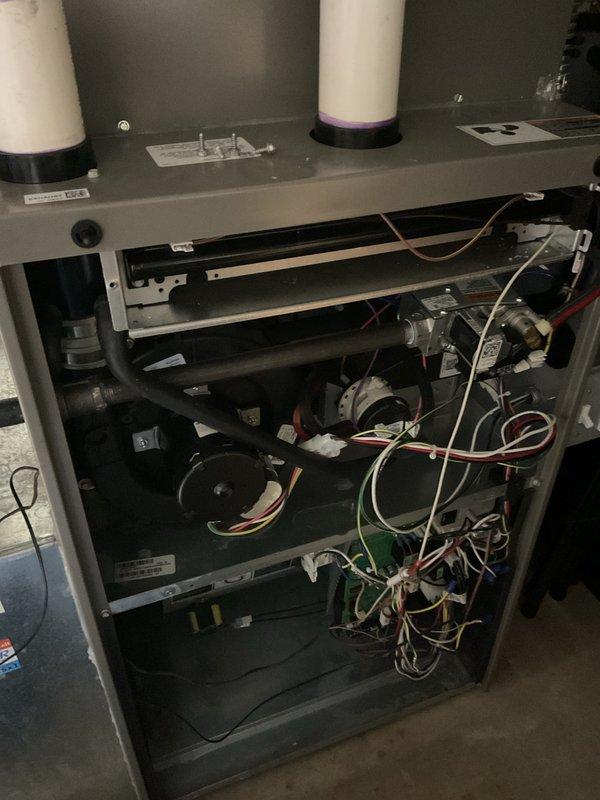 Completed annual furnace maintenance and tune-up on residential HVAC system. Performed comprehensive inspection of furnace unit, blower assembly, and internal electrical components. Verified all wiring connections, checked motor operation, and inspected heat exchanger. System operating within normal parameters with no issues identified at time of service.