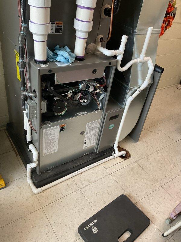 Completed routine maintenance inspection on residential gas furnace system. Accessed unit, inspected internal components including blower motor, gas valve assembly, flame sensor, ignition system, and electrical connections. All wiring harnesses, control modules, and safety devices verified in proper working condition with no visible signs of wear or deterioration. PVC condensate drain and vent piping inspected and confirmed secure. Unit operational and functioning within normal parameters.