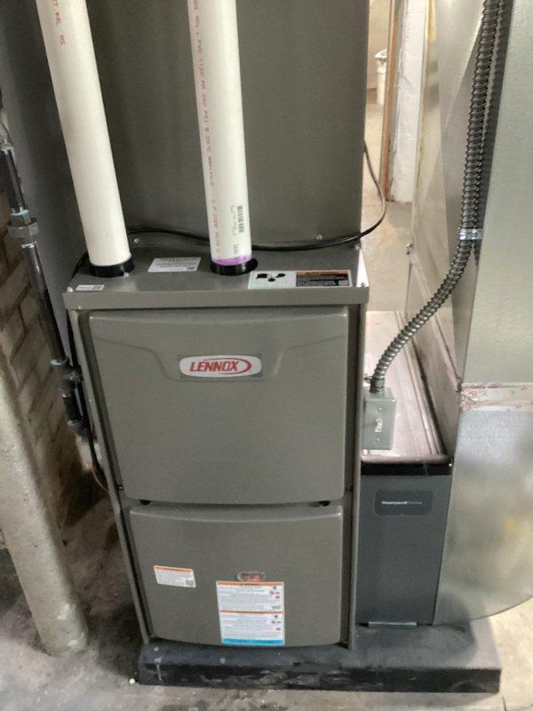 # Annual Furnace Maintenance - Lennox System

Completed comprehensive annual maintenance on residential Lennox furnace system. Performed full system inspection including internal components, refrigerant lines, electrical connections, and motor assembly. Verified all wire harnesses, capacitor, and control connections were secure and functioning properly. Inspected PVC intake and exhaust venting for proper installation and clearances. Confirmed unit operational status, checked all safety controls, and verified system performance. Equipment found in good operating condition with no immediate service needs identified. System tune-up completed per manufacturer specifications.