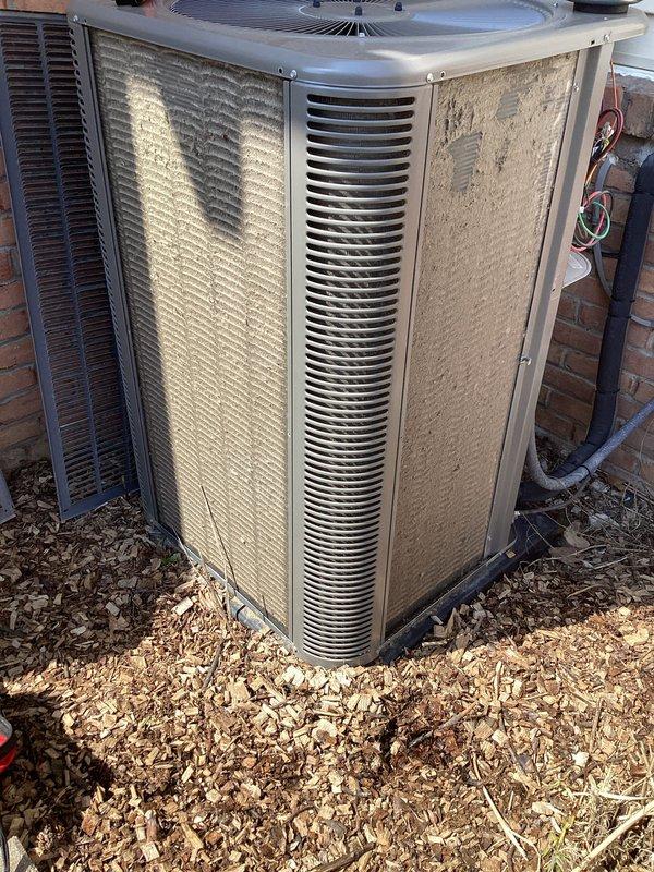 Completed routine Air Care Maintenance on outdoor condensing unit. Upon arrival, found condenser coil heavily clogged with dirt, debris, and outdoor contaminants restricting airflow. Cleaned and cleared coil fins, removed accumulated buildup from exterior surfaces, and inspected refrigerant lines and electrical connections. Unit operational and airflow restored to proper specifications.