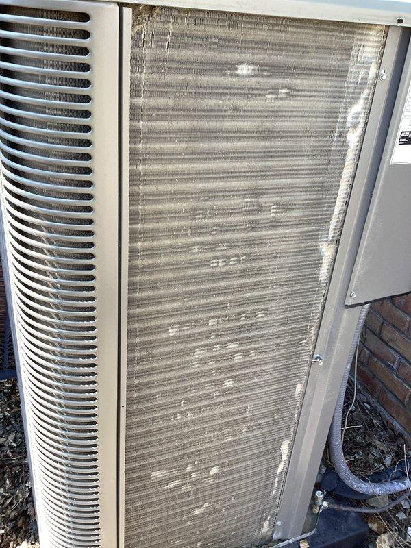 Completed routine Air Care Maintenance on outdoor condensing unit. Upon arrival, found condenser coil heavily clogged with dirt, debris, and outdoor contaminants restricting airflow. Cleaned and cleared coil fins, removed accumulated buildup from exterior surfaces, and inspected refrigerant lines and electrical connections. Unit operational and airflow restored to proper specifications.
