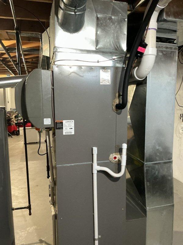 Replaced failed evaporator coil on Lennox HVAC system with new C33-60/60C-2F-6 model unit. System tested and verified operational with proper refrigerant pressures and airflow restored to manufacturer specifications.