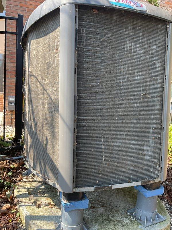 Completed annual cooling maintenance on two outdoor condensing units. Performed comprehensive inspection of both systems, including a Lennox unit with heavily soiled condenser coils requiring thorough cleaning to restore proper airflow and heat transfer efficiency. Cleaned debris accumulation from coil surfaces, verified refrigerant line connections, and confirmed proper operation of all components. Both units are now operating within manufacturer specifications.