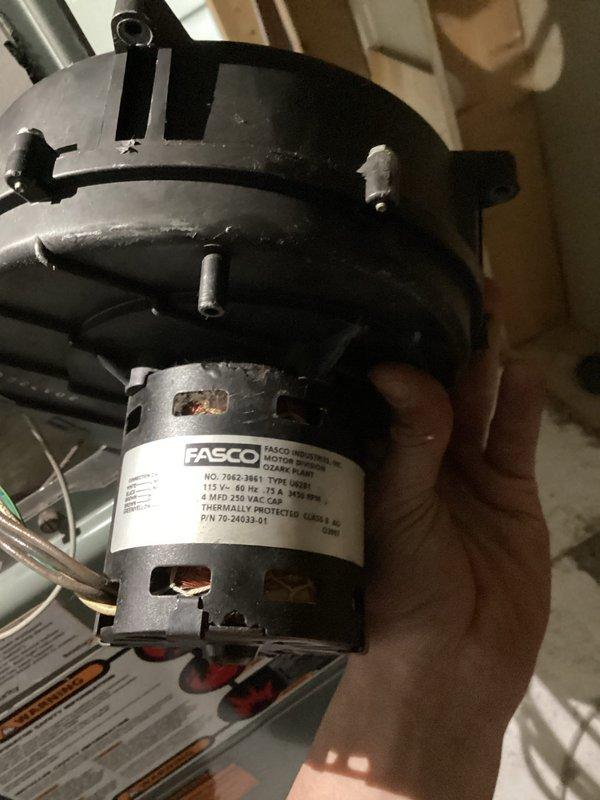 Responded to service call for furnace producing abnormal noise from blower assembly while maintaining heating operation. Upon inspection, found significant accumulation of dust and debris on blower wheel and housing, particularly around the squirrel cage fan assembly. Excessive buildup was causing operational noise and restricting airflow. Inspected Fasco blower motor for proper operation and mechanical integrity. Documented conditions with photographs showing debris accumulation on blower wheel interior and motor assembly. Coordinated access with tenant-occupied property for diagnostic evaluation.