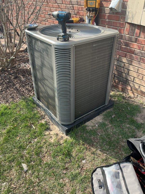# HVAC Maintenance - ACM

Performed comprehensive annual cooling maintenance on residential outdoor condensing unit. Conducted thorough visual inspection of condenser cabinet, verifying structural integrity of housing and louver vents. Inspected fan grille assembly and service valve accessibility at top of unit. Confirmed proper installation on concrete pad with appropriate vibration-dampening base. Evaluated unit positioning and clearances around perimeter for adequate airflow. Checked mounting security and levelness of installation. Documented equipment condition through photographic records. All components found to be in satisfactory operating condition with no immediate service needs identified. Unit ready for cooling season operation.