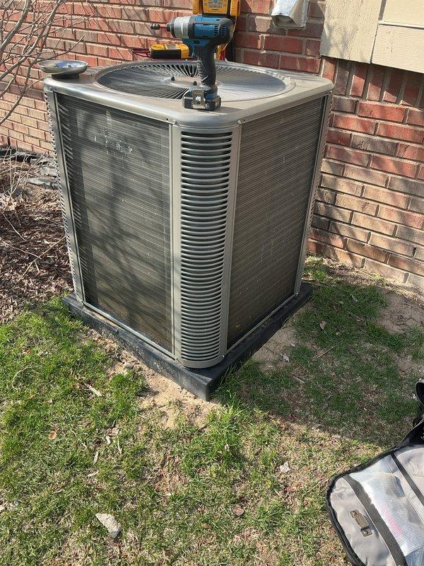 # HVAC Maintenance - ACM

Performed comprehensive annual cooling maintenance on residential outdoor condensing unit. Conducted thorough visual inspection of condenser cabinet, verifying structural integrity of housing and louver vents. Inspected fan grille assembly and service valve accessibility at top of unit. Confirmed proper installation on concrete pad with appropriate vibration-dampening base. Evaluated unit positioning and clearances around perimeter for adequate airflow. Checked mounting security and levelness of installation. Documented equipment condition through photographic records. All components found to be in satisfactory operating condition with no immediate service needs identified. Unit ready for cooling season operation.