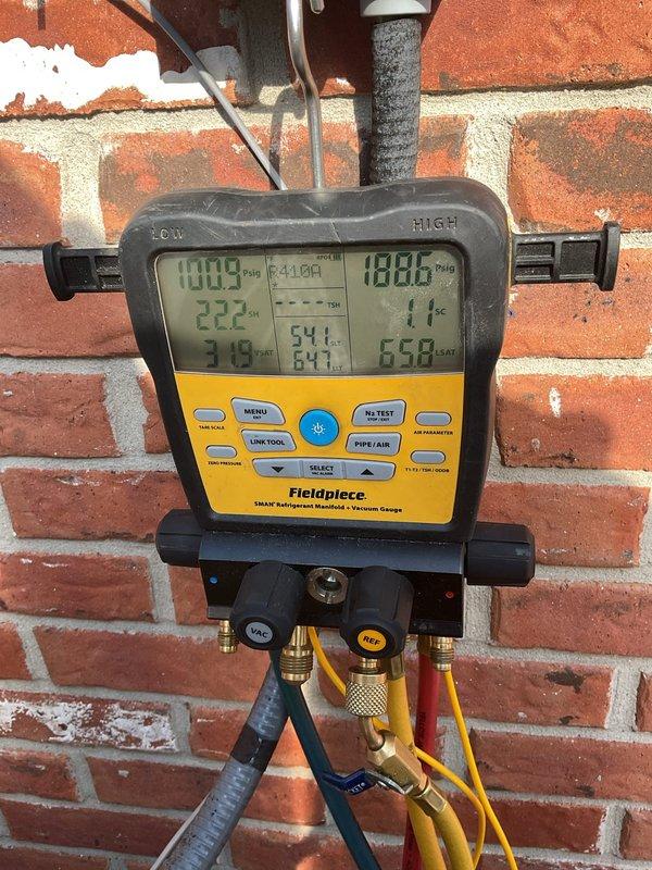 Performed scheduled Air Care Maintenance on Carrier outdoor condensing unit. Conducted comprehensive system evaluation including refrigerant pressure diagnostics using digital manifold gauges, which indicated proper operating pressures and refrigerant charge levels. Unit operating within normal parameters with no deficiencies noted at time of service.