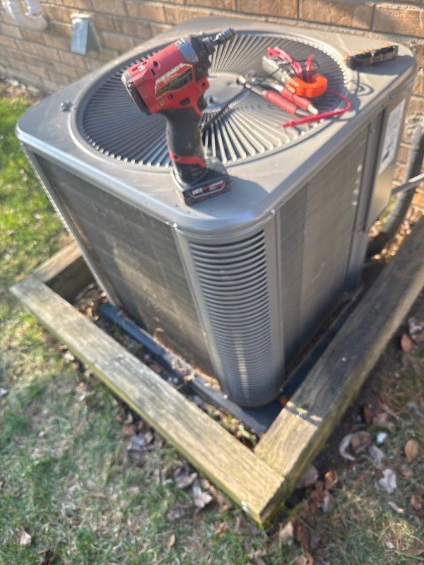 Completed annual preventive maintenance on residential split system air conditioning unit. Performed comprehensive inspection of outdoor condensing unit including electrical testing with multimeter, verified proper operation of condenser fan motor, and confirmed refrigerant line connections were secure with no visible leaks. Unit found in good operational condition with all components functioning within normal parameters.